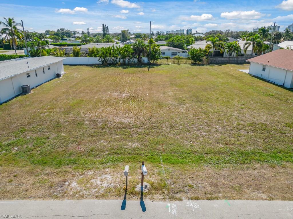 686 97th Avenue North Naples, FL 34108 - Photo 9 of 24 a view of an outdoor space and a yard