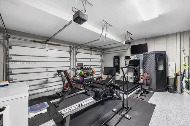 a bedroom with a large bed and a couch