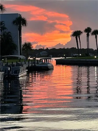 a view of a lake with a city view