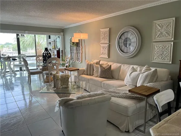 a room with furniture and a large window