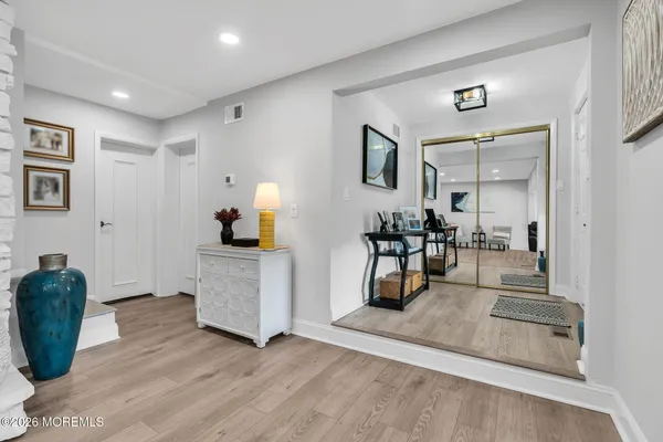 a living room with furniture and a table