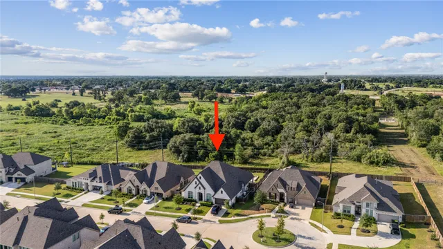 a view of swimming pool with outdoor seating