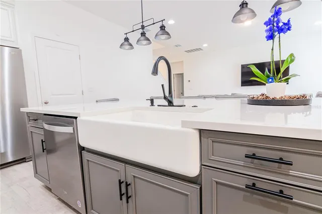 a bedroom with a bed and a table in it