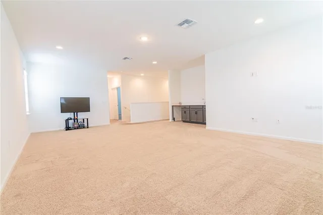 a bathroom with a sink a vanity and a toilet