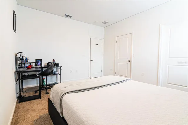 a bathroom with a sink a toilet and a shower