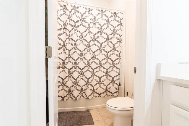 a bathroom with a sink vanity and mirror