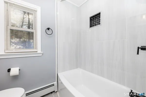 a bathroom with a sink and a bathtub