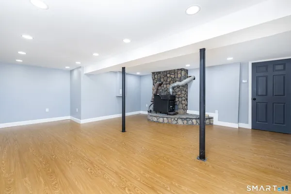 a view of an empty room with closet