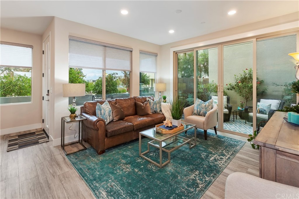 150 Catalyst Irvine, CA 92618 - Photo 2 of 25 a living room with furniture and a large window