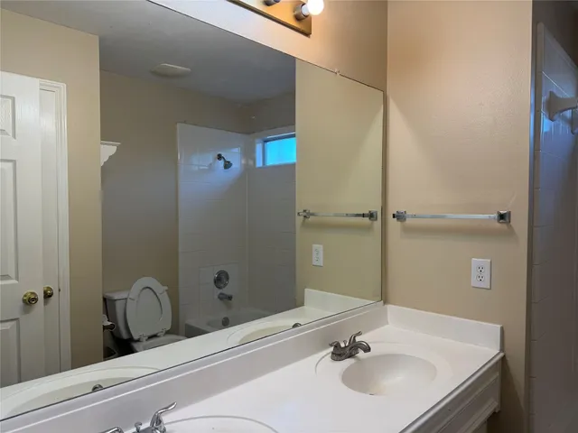 a bathroom with a sink and a tub