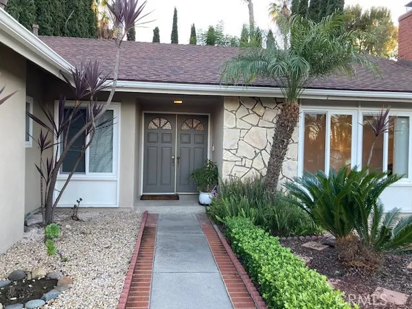 a view of a house with a small porch
