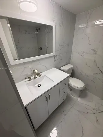 a bathroom with a toilet