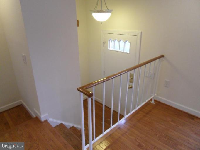2388 Hunters Square Court Reston, VA 20191 - Photo 2 of 21 Gleaming Hardwoods in Foyer & on the Main Floors