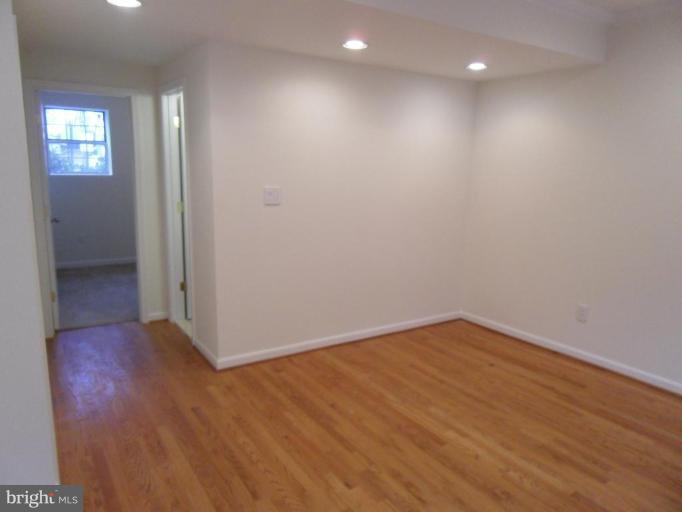 2388 Hunters Square Court Reston, VA 20191 - Photo 16 of 21 Rec Room with Hall to 4th Bedroom and Full Bath