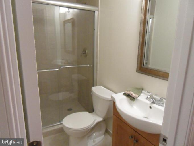 2388 Hunters Square Court Reston, VA 20191 - Photo 18 of 21 Basement Full Bathroom with Custom Ceramic Tile