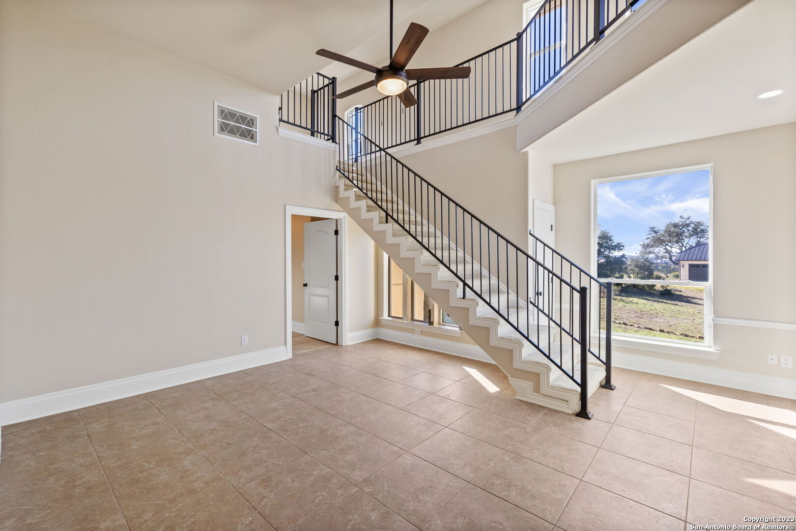 204 Paradise Point Drive Boerne, TX 78006 - Photo 25 of 32 a view of a hallway with a chandelier