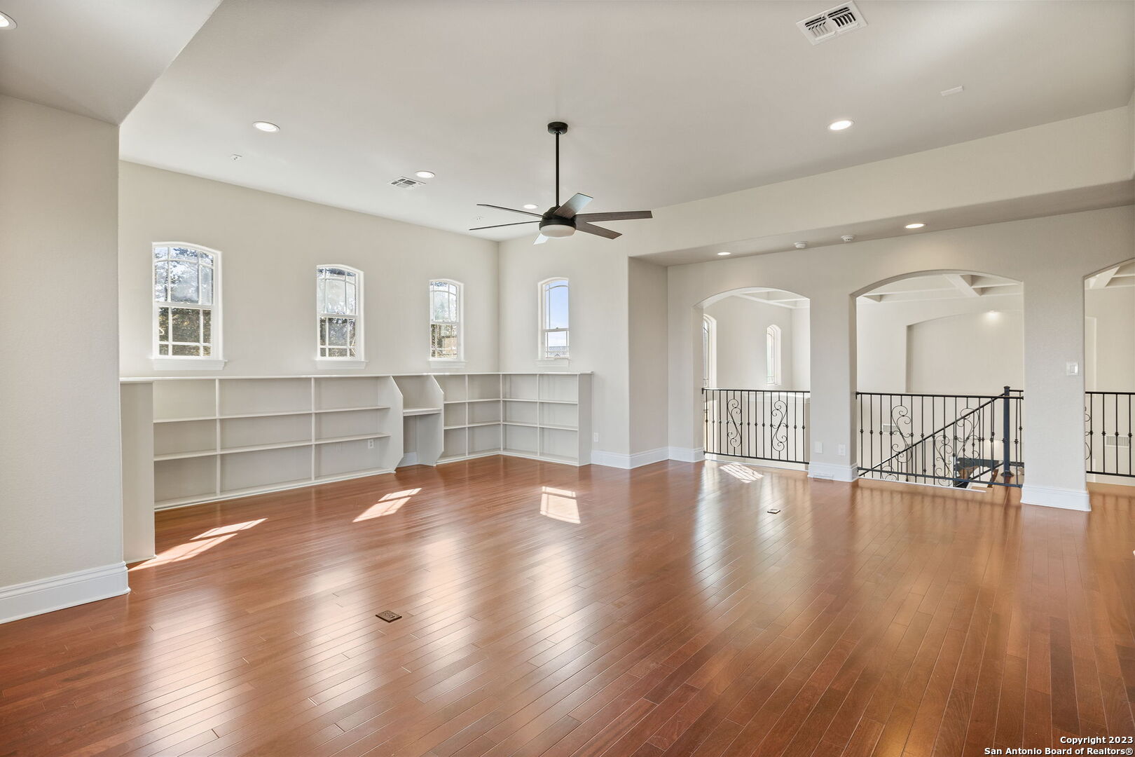 204 Paradise Point Drive Boerne, TX 78006 - Photo 29 of 32 a view of an empty room with wooden floor and a large window