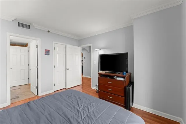 a bathroom with a sink a mirror and a toilet