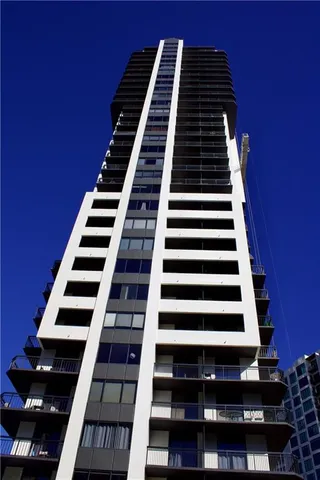 a lobby with furniture window and wooden floor