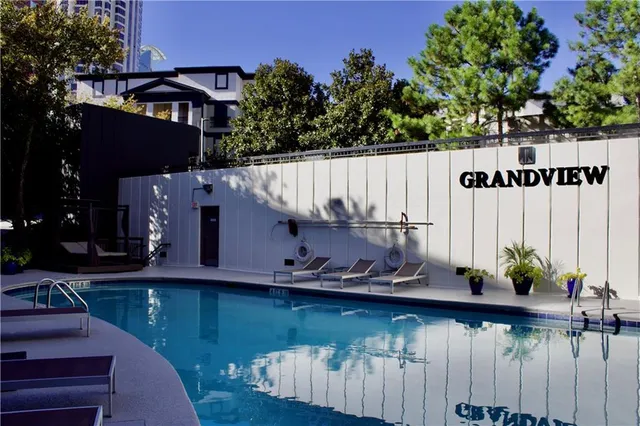 a room with furniture pool table and a table