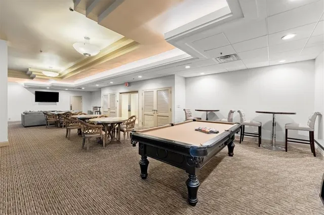 a view of a balcony with wooden floor