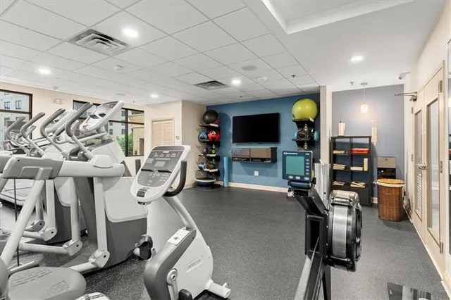 a view of a chairs and table on the wooden deck