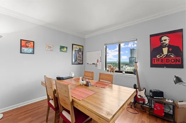a kitchen with a stove microwave and cabinets