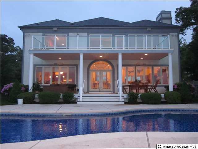 368 Mantoloking Road Brick, NJ 08723 - Photo 2 of 3 a front view of a house with garden