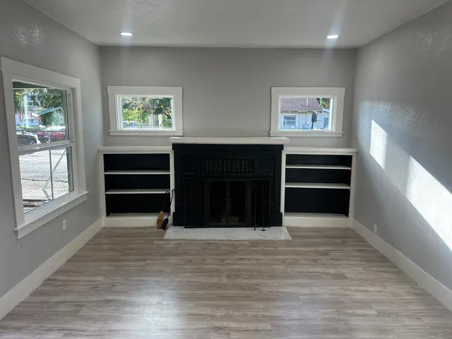 a view of an empty room with a window