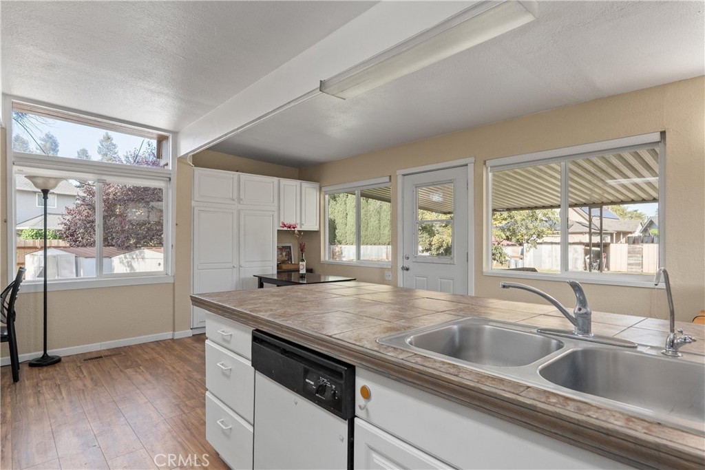 5574 California Street Chico, CA 95973 - Photo 13 of 30 a view with a sink and large windows
