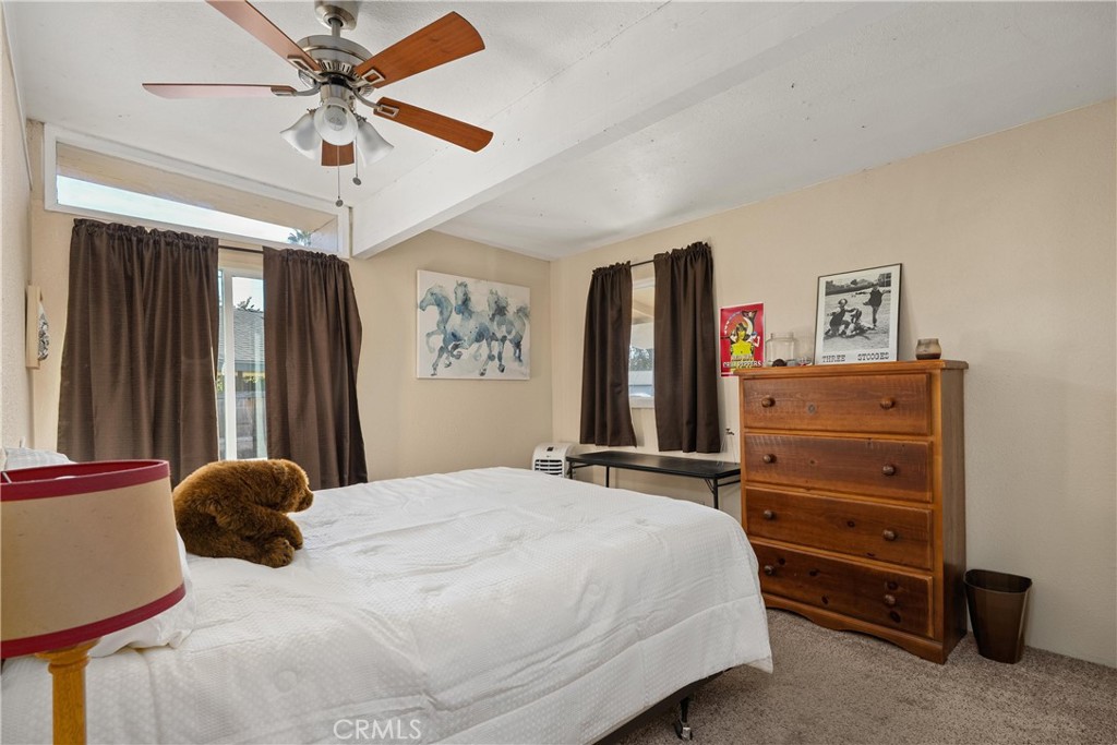 5574 California Street Chico, CA 95973 - Photo 15 of 30 a bedroom with a bed and a dresser