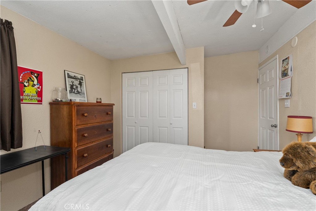 5574 California Street Chico, CA 95973 - Photo 16 of 30 a bedroom with a bed and a dresser