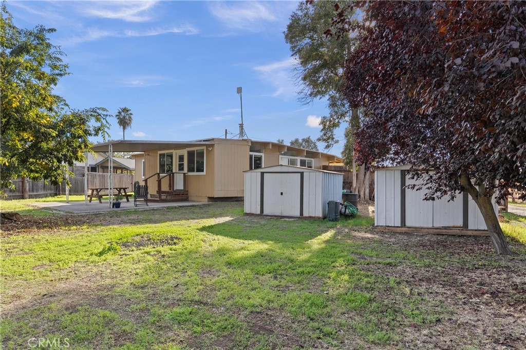 5574 California Street Chico, CA 95973 - Photo 28 of 30 a view of a house with swimming pool and a yard