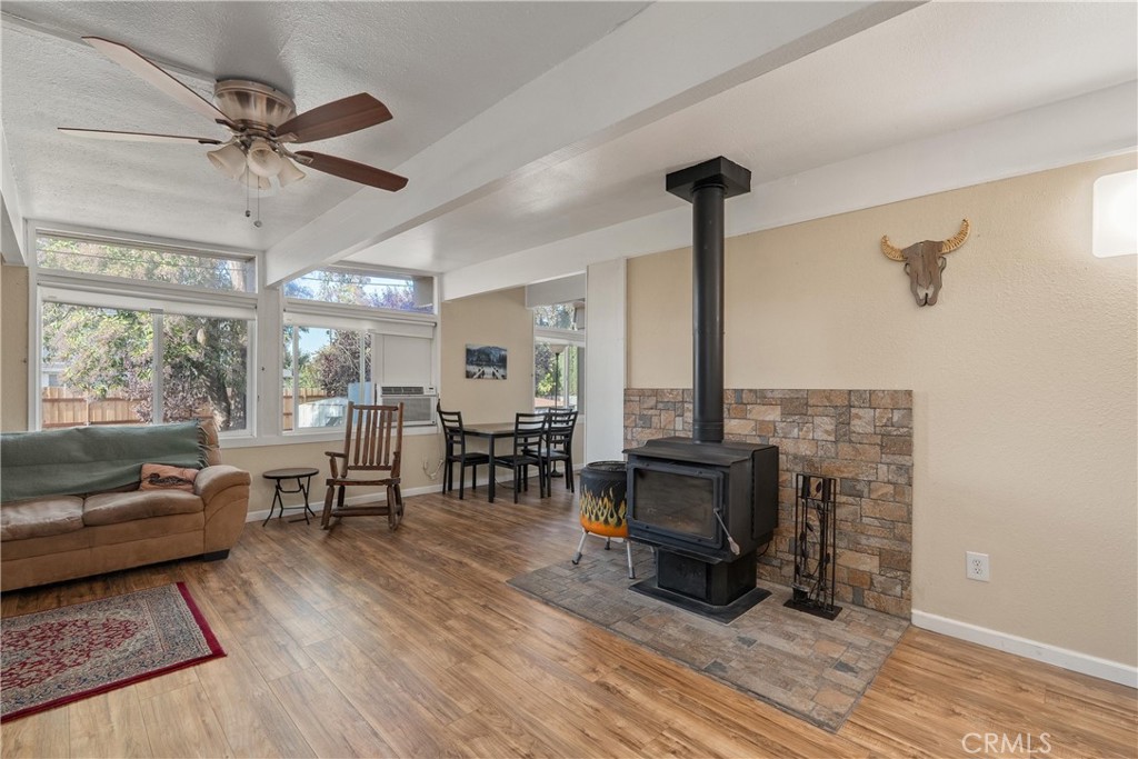 5574 California Street Chico, CA 95973 - Photo 3 of 30 a living room with furniture and a fireplace