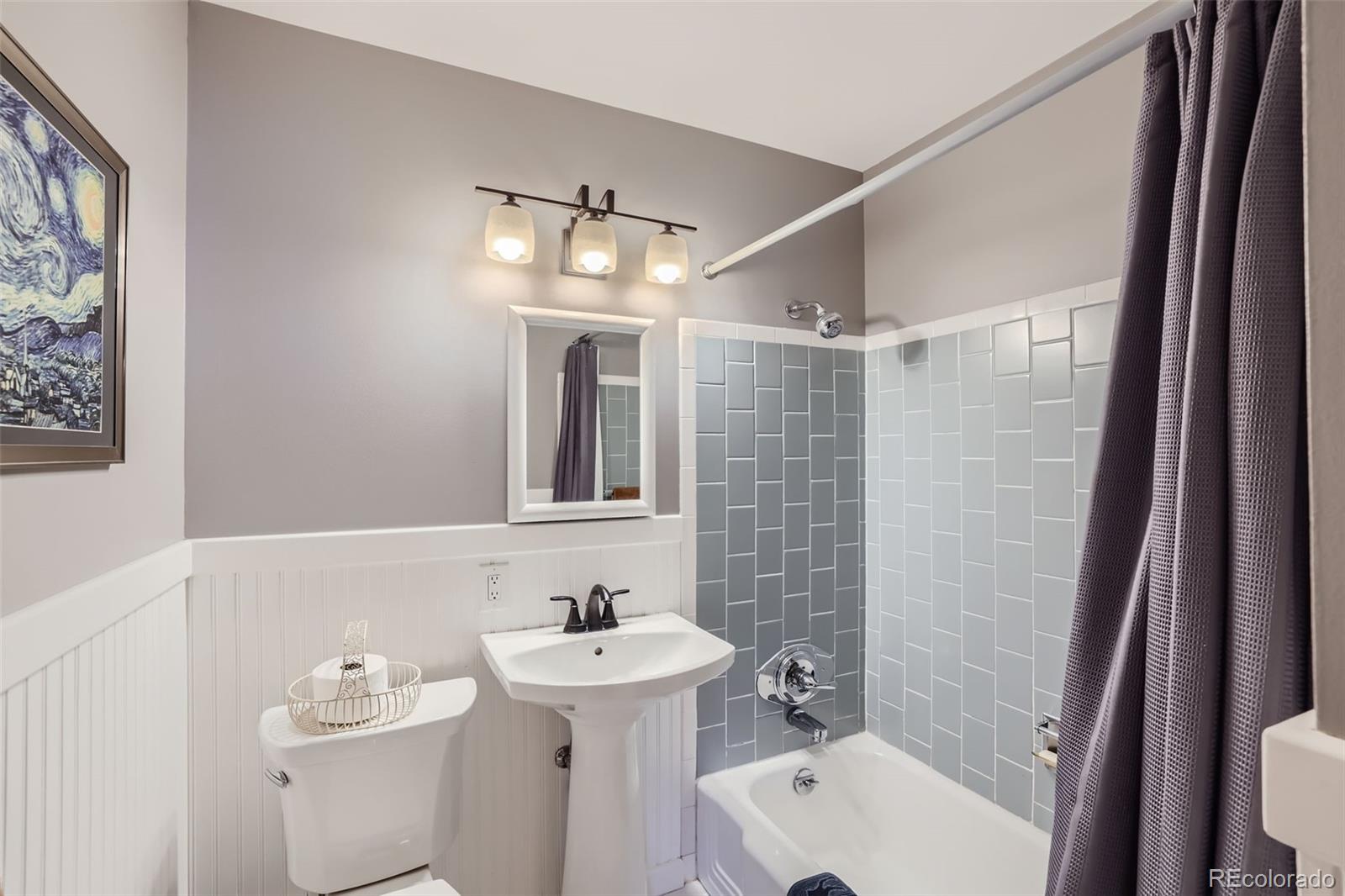 6290 Janice Way Arvada, CO 80004 - Photo 20 of 28 a bathroom with a sink toilet and shower