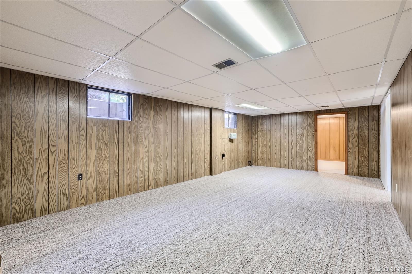 6290 Janice Way Arvada, CO 80004 - Photo 24 of 28 a view of empty room with closet and entryway