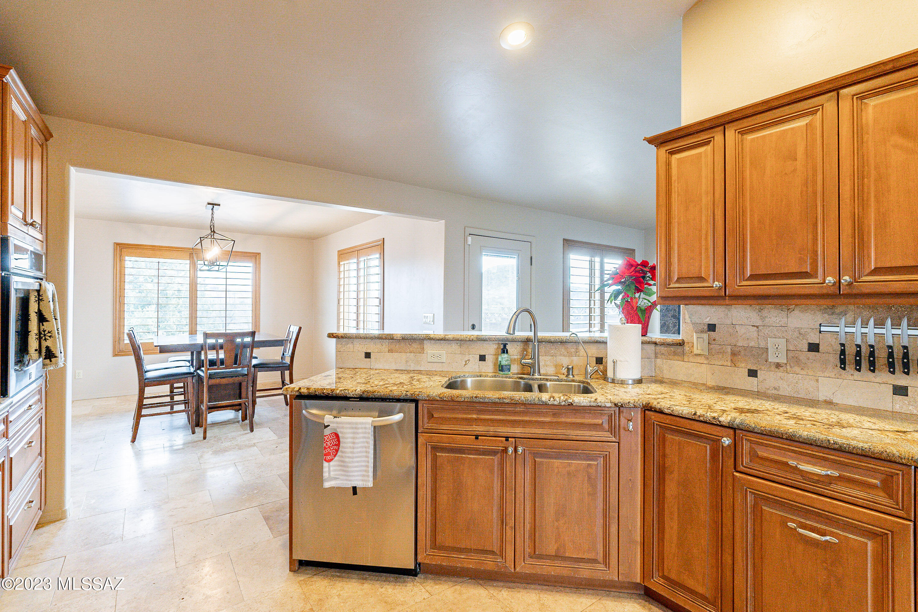 1135 Via San Francisco Rio Rico, AZ 85648 - Photo 10 of 29 a kitchen with a sink and cabinets