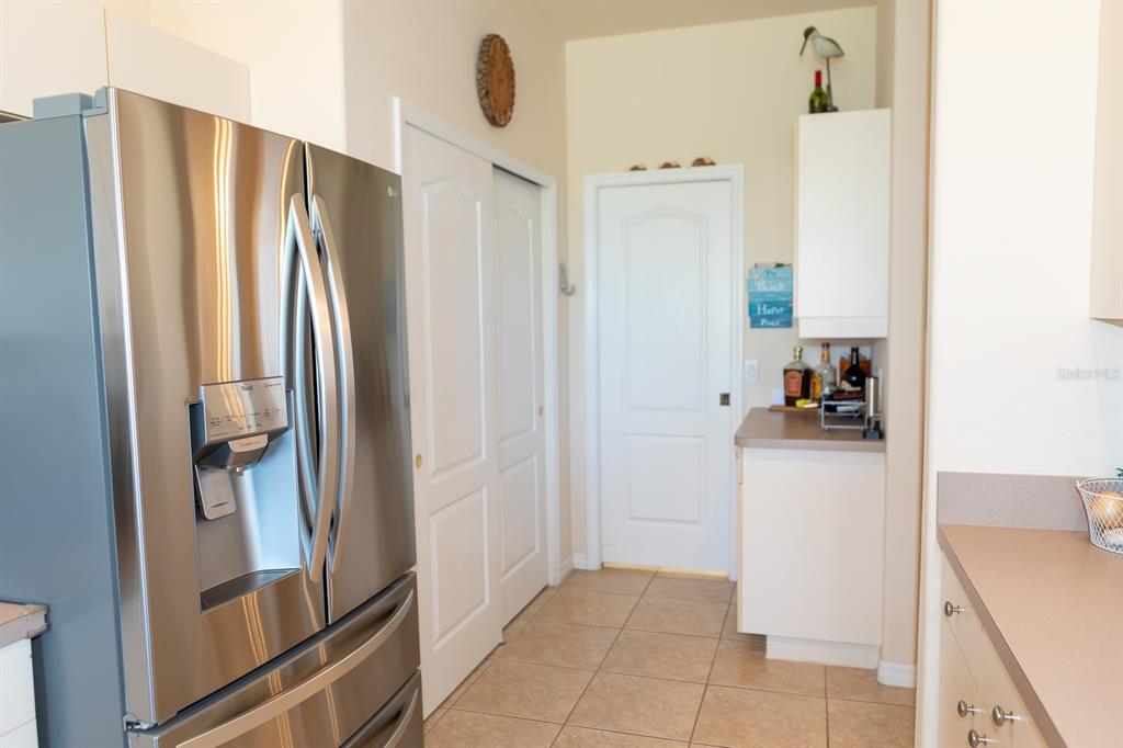14 Windward Terrace Placida, FL 33946 - Photo 16 of 41 a view of a kitchen from the hallway