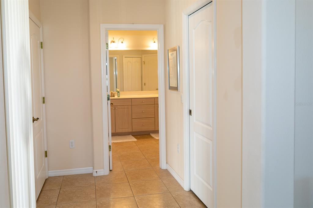 14 Windward Terrace Placida, FL 33946 - Photo 24 of 41 a view of a bathroom from a hallway