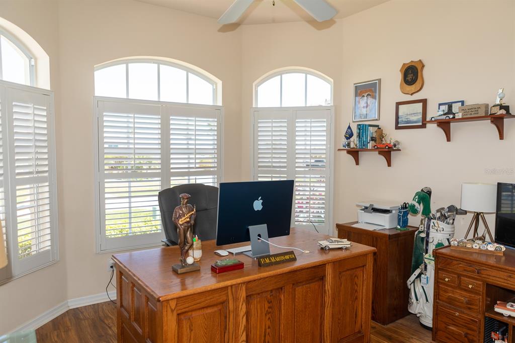 14 Windward Terrace Placida, FL 33946 - Photo 27 of 41 a view of a workspace with furniture and a window