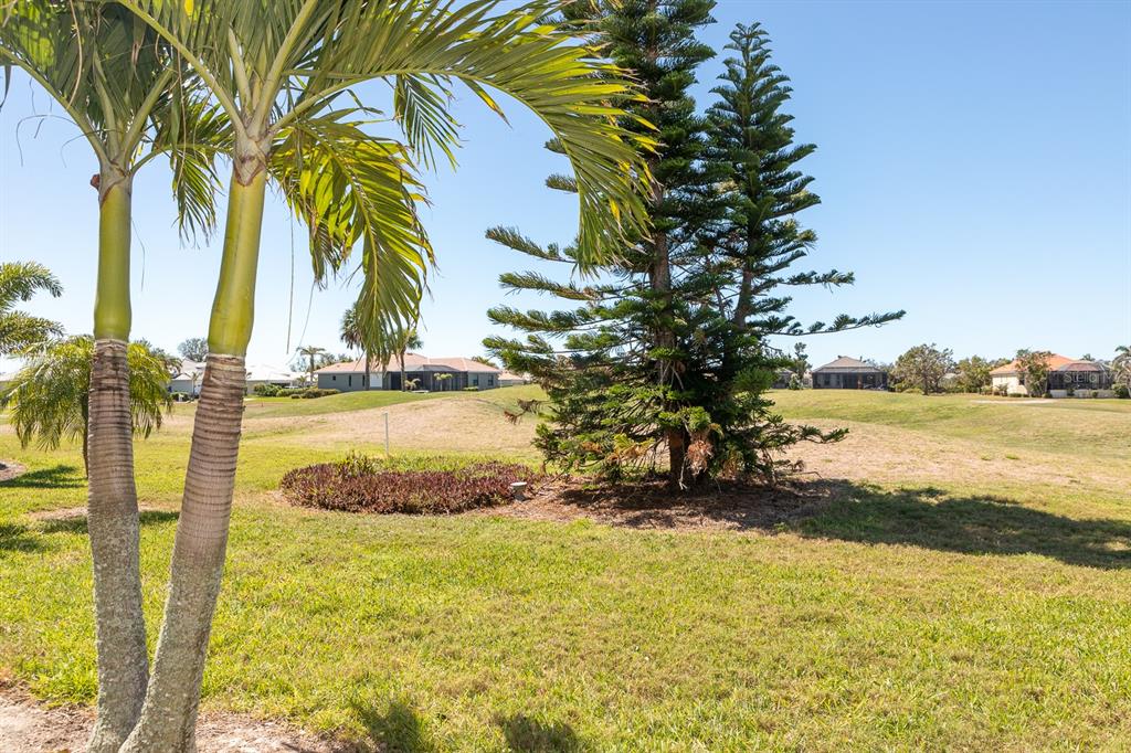 14 Windward Terrace Placida, FL 33946 - Photo 3 of 41 a view of a yard with swimming pool