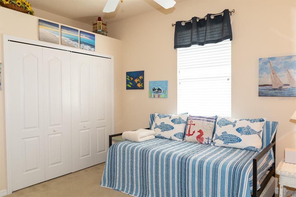 14 Windward Terrace Placida, FL 33946 - Photo 31 of 41 a bedroom with a bed and a window with the outer view