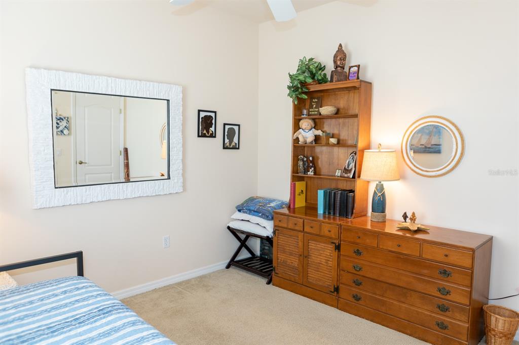 14 Windward Terrace Placida, FL 33946 - Photo 32 of 41 a room with gym equipment and a mirror