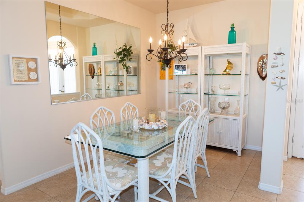14 Windward Terrace Placida, FL 33946 - Photo 9 of 41 a dining room with furniture and chandelier