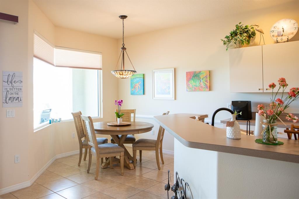 14 Windward Terrace Placida, FL 33946 - Photo 10 of 41 a dining room with furniture and window