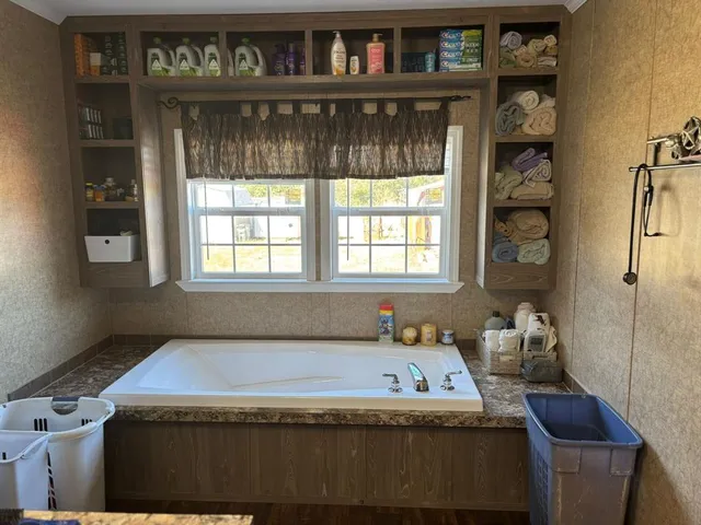 a view of bath room with window