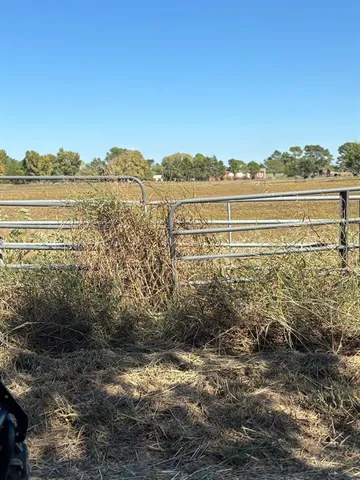 a view of a lake with a big yard
