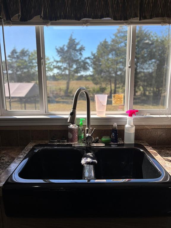 7067 South State Highway 78 Bonham, TX 75418 - Photo 9 of 40 a kitchen view with a sink and large window