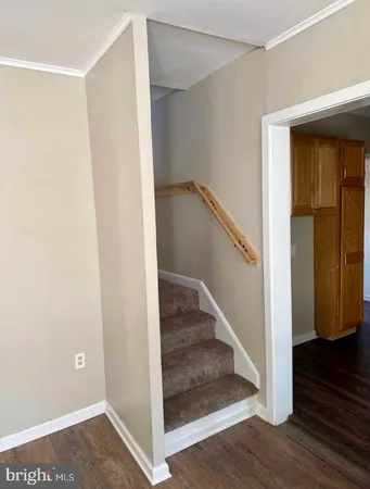 a view of entryway with wooden floor