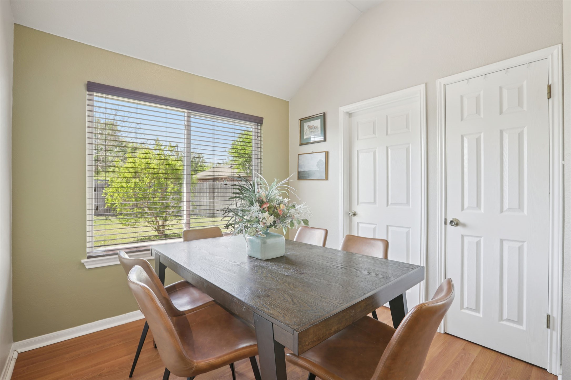 902 Ridgemont Circle Leander, TX 78641 - Photo 11 of 34 a view of a dining room with furniture window and wooden floor